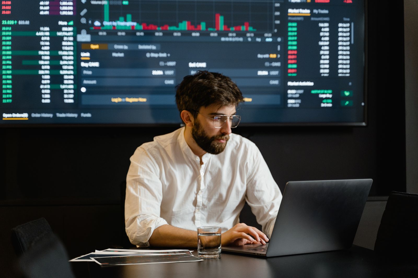 Financial data and charts viewed on a laptop